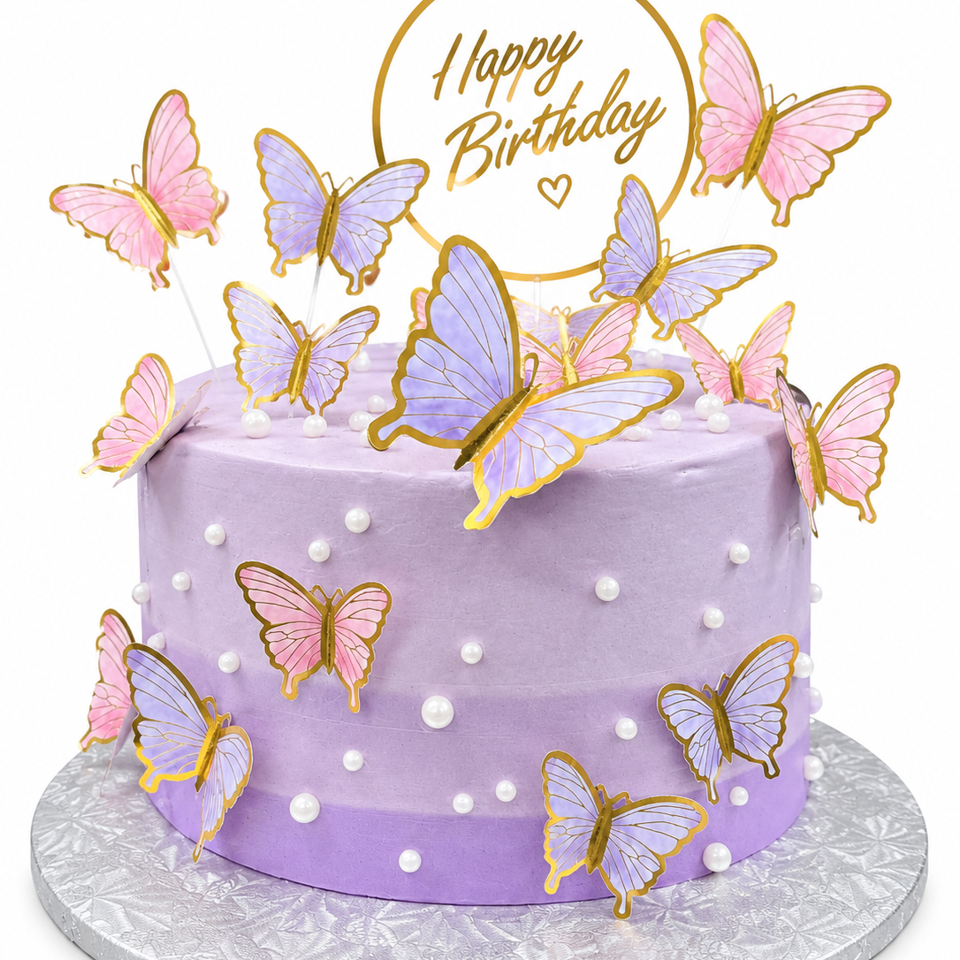 Lavender birthday cake decorated with pink and purple butterflies, pearl accents, and a gold “Happy Birthday” topper.